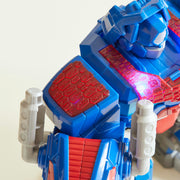 Transformers Dinobot Adventures Optimus Prime T-Rex Converting Toy with Lights and Sounds, 9+ Inch Action Figure, Ages 3 and Up (Amazon Exclusive)